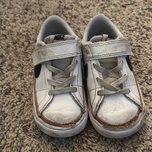 Nike Kids White Sneakers with Black Swoosh and Brown Trim